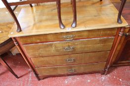 A Continental fruitwood four drawer chest flanked by facetted pilasters 102cm wide
