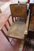 An `Arts & Crafts` oak armchair, an oak drop-leaf table and an oak two tier occasional table. Best