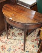 A 19th Century mahogany demi lune tea table with square tapering legs 86cm wide