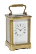 A French small brass carriage timepiece, early 20th century, the eight-day movement with silvered