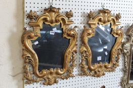 A pair of Italian style giltwood mirrors 54 x 41cm