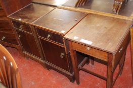 A pair of mahogany bedside cupboards together with a mahogany drop leaf table with a frieze drawer