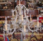 A two tier three over six branch glass and brass electrolier (sold as parts)