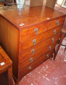 A Georgian style walnut chest of drawer 102cm high, 86cm wide, walnut cabinet and a walnut corner