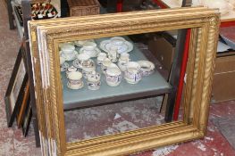 A pair of large gilt picture frames; 84 x 99cm (exterior dimensions)