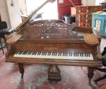 A walnut baby grand piano, Neumeyer, Berlin, no. 16501  Best Bid