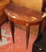 A Regency mahogany demi lune tea table 77cm high, 75cm wide