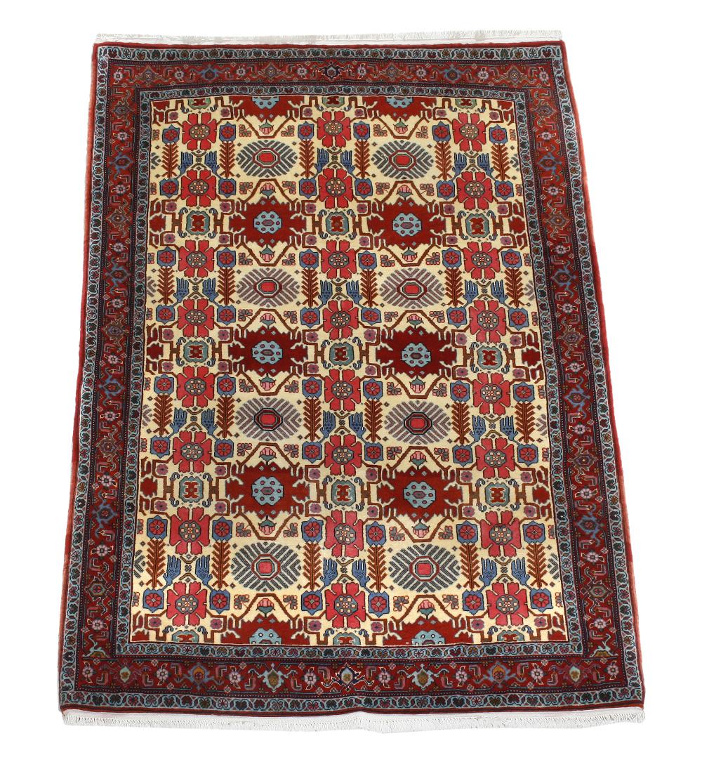 A Caucasian rug with stylized decoration to central field 186 x 120cm