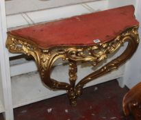 A marble mounted gilt console table, 20th century