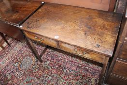 A Georgian mahogany two drawer side table 90cm wide Best Bid