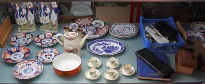 A mixed group to include a Poole pottery fruit bowl, two Staffordshire highland figural groups, a