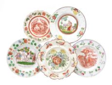 Five assorted British pottery children`s plates, including an example of DR SYNTAX SELLS GRIZZLE,