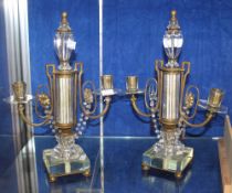 A pair of French glass and gilt metal mounted, twin branch candle holders; 36cm high