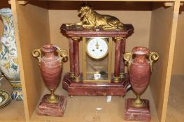 A French gilt mounted red marble mantle clock garniture set, with floral decorated enamel dial and