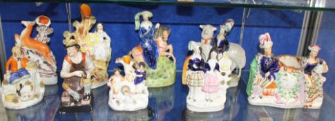 A mixed quantity of nine Staffordshire pottery figures (some a/f)