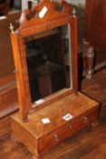 An early 19th century mahogany dressing mirror