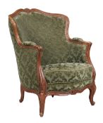 A Louis XV style upholstered bergere