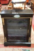 A Victorian ebonised and gilt metal mounted display cabinet enclosing shelves 78cm wide