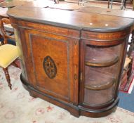 A Victorian walnut and inlaid credenza the central cupboard enclosing shelves 138cm wide
