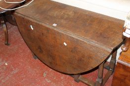 A Jacobean style oak gateleg table 110cm wide