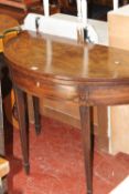 A George III mahogany demi-lune folding tea table 109cm wide
