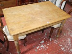 A pine kitchen table on ring turned legs 110cm length