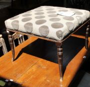 A late Victorian upholstered stool with ring turned and outswept legs 58cm high