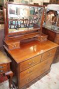 An Edwardian mahogany and inlaid dressing table, two short and two long drawers, bearing