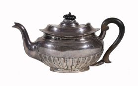 A silver oval half gadrooned teapot by Jay, Richard Attenborough Co A silver oval half gadrooned