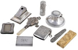 A collection of silver, to include: an Edwardian silver vesta case by... A collection of silver,
