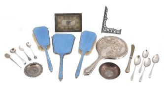 A collection of silver items, to include: a three piece silver mounted and... A collection of silver