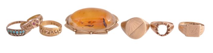 An agate brooch, the oval cabochon agate within a decorative border, 4 An agate brooch, the oval