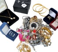 A collection of costume jewellery, including: bracelets; and other items A collection of costume