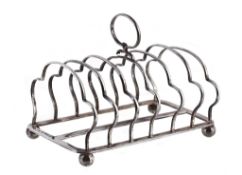 A Victorian silver six division toast rack by Roberts & Slater, Sheffield 1851 A Victorian silver