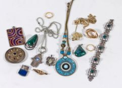 A selection of jewellery, to include: two gold coloured rings; pendants;... A selection of