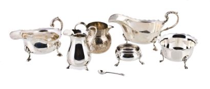 A collection of silver items, to include: a late Victorian silver shaped... A collection of silver