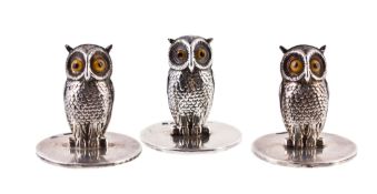 Three silver owl menu holders, two by Sampson Mordan & Co Three silver owl menu holders, two by