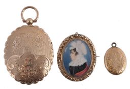 A mid Victorian locket, circa 1870, the oval locket composed of two... A mid Victorian locket, circa