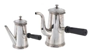 Two French electro-plated coffee pots by Christofle Two French electro-plated coffee pots by