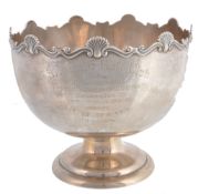 An Edwardian silver pedestal rose bowl by William Henry Sparrow An Edwardian silver pedestal rose