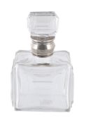 An Art Deco cut glass cologne bottle with silver coloured collar, stamped €0` An Art Deco cut