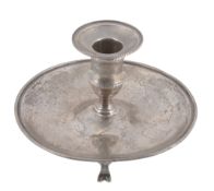 A George III silver circular chamber candlestick, maker`s mark illegible A George III silver