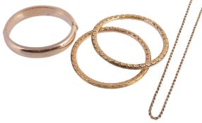 A gold coloured hinged bangle, 5.6cm inner diameter; a 9 carat belcher link... A gold coloured