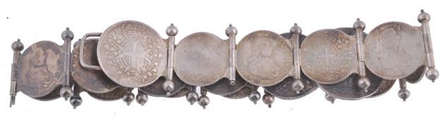 A silver belt of conjoined 18th century Maltese coins A silver belt of conjoined 18th century