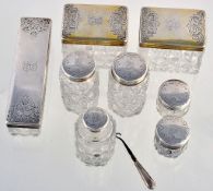 Seven cut glass dressing table pots and jars with silver covers by Thomas... Seven cut glass