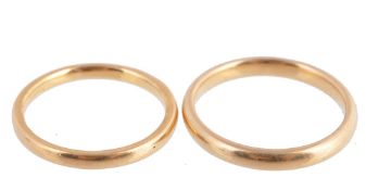 Two 22 carat gold wedding bands , finger sizes M 1/2 and P, 6.9g Two 22 carat gold wedding bands ,