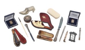 A collection of objects, including two Italian silver coloured rectangular... A collection of