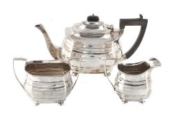 A silver three piece tea service by George Nathan & Ridley Hayes, Chester 1912 A silver three