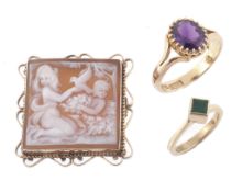 An amethyst dress ring, the oval cut amethyst within a claw setting An amethyst dress ring, the oval