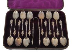A cased set of twelve Victorian silver gilt apostle tea spoons and a pair of... A cased set of